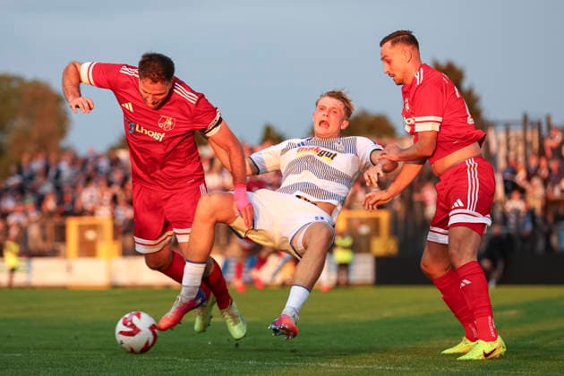 Maik Bleckmann of 1 FC Wuelfrath, Peter Remmert of MSV Duisburg, and Arman Corovic of 1 FC Wuelfrath in a tackle during the Lower Rhine Cup match between 1 FC Wuelfrath and MSV Duisburg, at the IMS Arena on August 25, 2026, in Velbert, Germany. Photo by Oliver Kaelke, DeFodi Images. Maik Bleckmann of 1 FC Wuelfrath, Peter Remmert of MSV Duisburg and Arman Corovic of 1 FC Wuelfrath battle for the ball during the 3. Liga match between 1 FC Wuelfrath and MSV Duisburg at IMS Arena on August 25, 2026 in Velbert, Germany. Photo by Oliver Kaelke, DeFodi Images. DFB and DFL regulations prohibit any use of photographs as image sequences and or quasi-video. Photo by Oliver Kaelke, DeFodi Images.