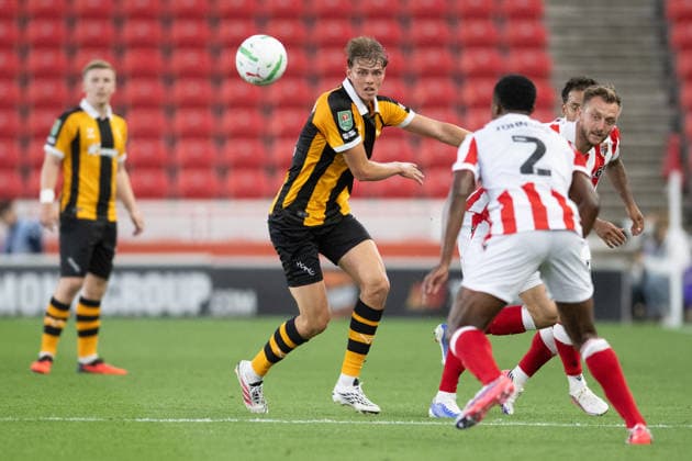 Stoke City v Hull City Carabao Cup Jens Hjerto-Dahl of Hull City clashes with Stoke City players during the Carabao Cup Second Round match between Stoke City and Hull City at the bet365 Stadium, Stoke-on-Trent 25 08 2026 UK Newspapers OUT Copyright: xMattxWilkinsonx FIL-23823-0225