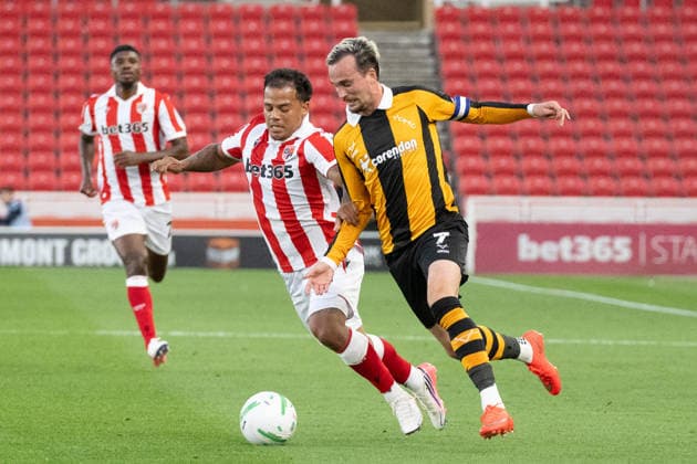 Stoke City v Hull City Carabao Cup Liam Millar of Hull City takes the ball past Million Manhoef of Stoke City during the Carabao Cup Second Round match between Stoke City and Hull City at the bet365 Stadium, Stoke-on-Trent 25 08 2026 UK Newspapers OUT Copyright: xMattxWilkinsonx FIL-23823-0232