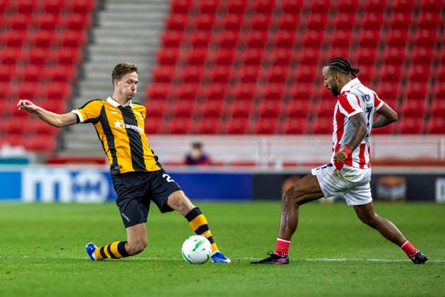 25th August 2026; Bet365 Stadium, Stoke, Staffordshire, England; Carabao Cup Football, Stoke City versus Hull City; Sorba Thomas of Stoke City is tackled by Kieran Dowell of Hull City TimxWilliams