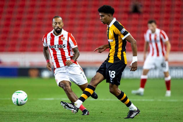 25th August 2026; Bet365 Stadium, Stoke, Staffordshire, England; Carabao Cup Football, Stoke City versus Hull City; Cody Drameh of Hull City under pressure from Sorba Thomas of Stoke City TimxWilliams