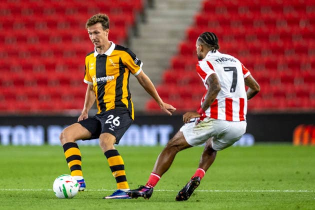 25th August 2026; Bet365 Stadium, Stoke, Staffordshire, England; Carabao Cup Football, Stoke City versus Hull City; Kieran Dowell of Hull City under pressure from Sorba Thomas of Stoke City TimxWilliams