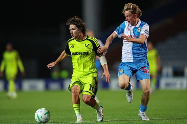 25th August 2026; Ewood Park, Blackburn, England; Carabao Cup Football, Blackburn Rovers versus Sheffield United; Callum O Hare of Sheffield United runs with the ball whilst Frank Vare of Blackburn Rovers pursues AidanxHunter