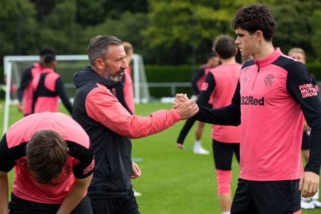 Rangers manager Derek McInnes shakes hands with Kosta Nedeljkovic at training ahead of tomorrow s UEFA Conference League qualifying match against Jablonec. Rangers Training - The Rangers Training Centre, Glasgow, Lanarkshire, Scotland, UK - 26 Aug 2026Glasgow The Rangers Training Centre Lanarkshire United Kingdom  Copyright: xO Rourke RangersxFC Shutterstockx 17117524ab