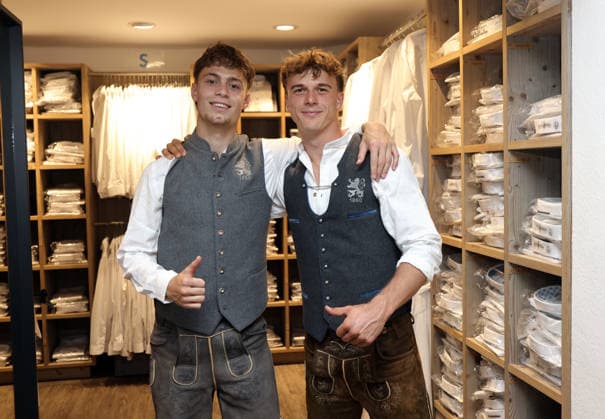 Soccer, Men s, Oktoberfest Outfits, 2026–2027 Season, TSV 1860 Munich, Angermaier Traditional Attire: Emre Erdogan of TSV 1860 Munich (left) with Julian Bell of TSV 1860 Munich (right) in traditional attire, wearing lederhosen, standing, giving a thumbs-up
