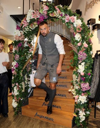 Soccer, Men s, Oktoberfest Outfits, 2026–2027 Season, TSV 1860 Munich, Traditional Attire by Angermaier Felix Weber: TSV 1860 Munich players come down the stairs wearing traditional attire and lederhosen