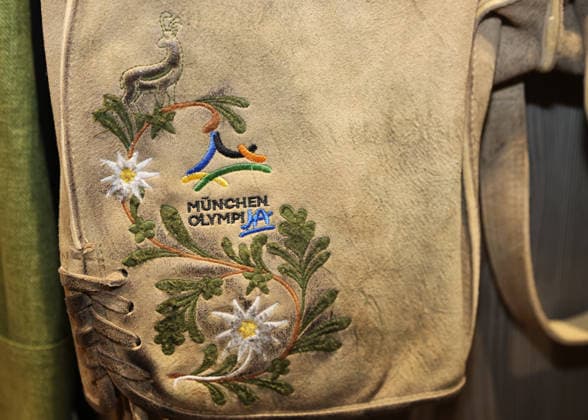 Soccer, Men s, Oktoberfest Outfits, 2026–2027 Season, TSV 1860 Munich, Angermaier Traditional Attire: Here are a pair of lederhosen featuring the embroidery München OlympiJA, Munich s Olympic bid, the Summer Olympics, logo, and coat of arms