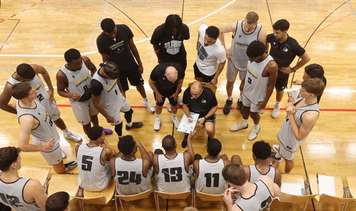 Ludwigsburg, Basketball Exhibition Game: MHP Riesen Ludwigsburg vs. HAKRO Merlins Crailsheim; Coach Carles Duran of the Riesen stands in the center with his team