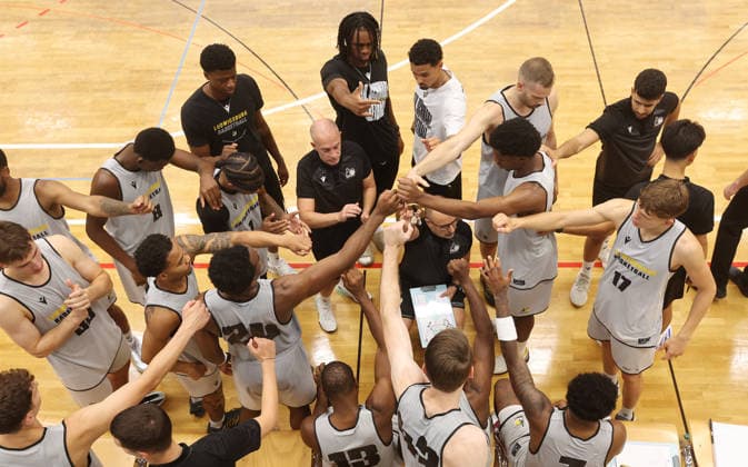 Ludwigsburg, Basketball Exhibition Game: MHP Riesen Ludwigsburg vs. HAKRO Merlins Crailsheim; Coach Carles Duran of the Riesen stands in the center with his team