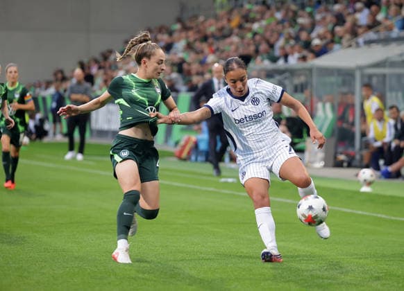 Sophia Kleinherne of VfL Wolfsburg faces off against Haley Bugeja of Inter Milan — Soccer, Women s, 2026–2027 Season, Women s Champions League Qualifying, Round 3, VfL Wolfsburg vs. Inter Milan, 2–0