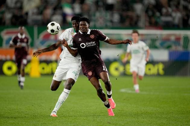 Pierre Landry Kabore of Heart of Midlothian in action against Kenan Muharemovic of SK Rapid during a UEFA Conference League Play-Off Second Leg match between SK Rapid and Hearts at Weststadion on August 26, 2026 in Vienna, Austria. Rapid Vienna v Heart of Midlothian, UEFA Conference League, Play-Off Round, Second Leg, Football, Allianz Stadion, Vienna, Austria - 26 Aug 2026Vienna Allianz Stadion Austria  Copyright: xChristianxHofer Shutterstockx 17115048gd