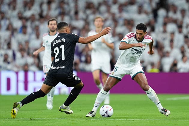 August 26, 2026, Madrid, Madrid, Spain: Jude Bellingham of Real Madrid CF and Yangel Herrera of Real Sociedad compete for the ball during the Spanish League, LaLiga EA Sports, football match played between Real Madrid and Real Sociedad at Bernabeu stadium on August 26, 2026, in Madrid, Spain. Madrid Spain - ZUMAa181 20260826_zaa_a181_089 Copyright: xDennisxAgyemanx