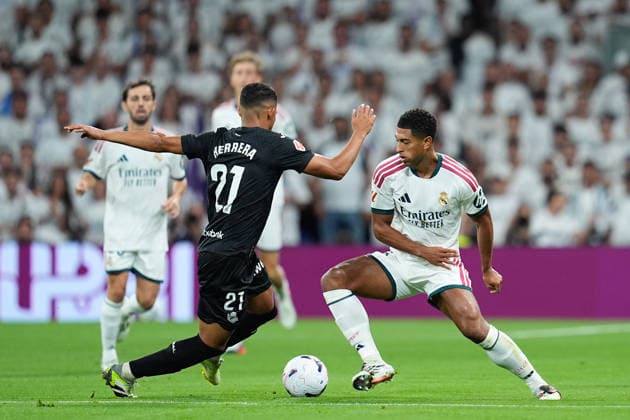 August 26, 2026, Madrid, Madrid, Spain: Jude Bellingham of Real Madrid CF and Yangel Herrera of Real Sociedad compete for the ball during the Spanish League, LaLiga EA Sports, football match played between Real Madrid and Real Sociedad at Bernabeu stadium on August 26, 2026, in Madrid, Spain. Madrid Spain - ZUMAa181 20260826_zaa_a181_090 Copyright: xDennisxAgyemanx