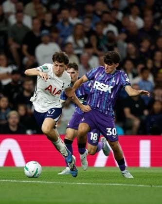 Mikey Moore of Tottenham Hotspur takes on Rob Apter of Charlton Athletic Tottenham Hotspur v Charlton Athletic, EFL Carabao Cup, Second Round, Football, Tottenham Hotspur Stadium, London, UK - 26 Aug 2026London Tottenham Hotspur Stadium United Kingdom EDITORIAL USE ONLY No use with unauthorised audio, video, data, fixture lists, club league logos or live services. Online in-match use limited to 120 images, no video emulation. No use in betting, games or single club league player publications.  Copyright: xMattxImpey Shutterstockx 17115050aq