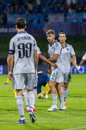 Team SK Slovan Bratislava seen celebrating a goal during UEFA Champions league second leg play-off game between teams of SK Slovan Bratislava and Celje (Dominika Kortvelyesiova Ball Raw Images) Celje Stadion Celje Slovenia Copyright: xDominikaxKortvelyesiovax DKOR3711