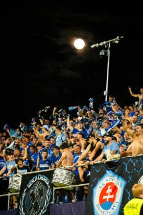 NK Celje vs. SK Slovan Bratislava in the UEFA Champions League play-off round. SK Slovan Bratislava fans cheering during NK Celje vs. SK Slovan Bratislava in the UEFA Champions League play-off round. celje Slovenia  Copyright: xNikxErikxNeubauerx DSC_5463