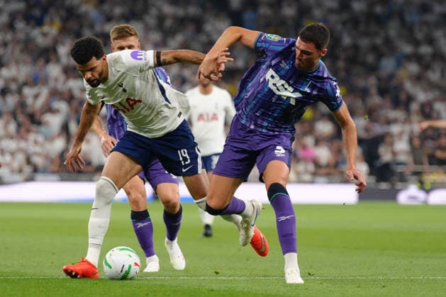 26th August 2026; Tottenham Hotspur Stadium, London, England; Carabao Cup Football, Tottenham Hotspur versus Charlton Athletic; Dominic Solanke of Tottenham Hotspur is challenged by Lloyd Jones of Charlton Athletic TomxMajor