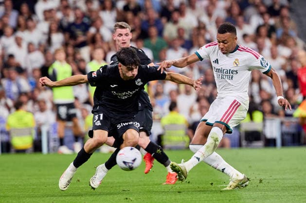 August 26, 2026, Madrid, Madrid, Spain: Kylian Mbappe of Real Madrid CF and Jon Martin of Real Sociedad during La Liga football match between Real Madrid CF and Real Sociedad at Santiago Bernabeu Stadium in Madrid, Spain, August 26, 2026 Soccer 2026: Real Madrid CF Vs Real Sociedad  - ZUMAa206 20260826_zsp_a206_080 Copyright: xRubenxAlbarranx