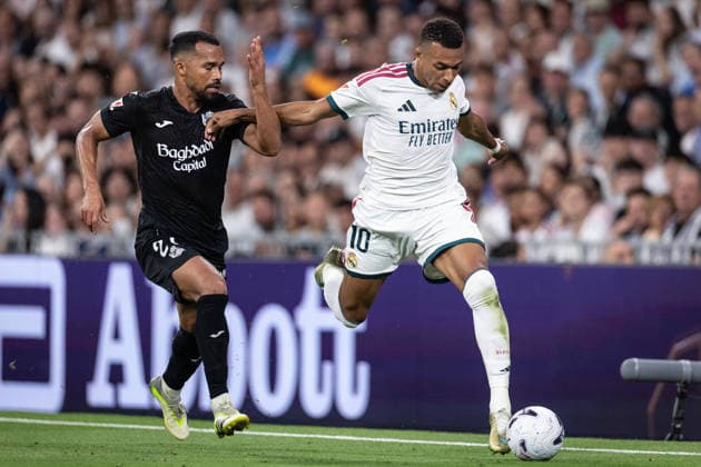 MADRID, SPAIN - AUGUST 26: Kylian Mbappe of Real Madrid (R) runs with the ball under pressure from Yangel Herrera of Real Sociedad (L) during the LaLiga EA Sports football match between Real Madrid and Real Sociedad at Estadio Santiago Bernabeu on August 26, 2026 in Madrid, Spain. (Photo by Ricardo Nogueira Sports Press Photo) Copyright: xRicardoxNogueira SportsxPressxPhotox Sportspressphoto_SPR216488