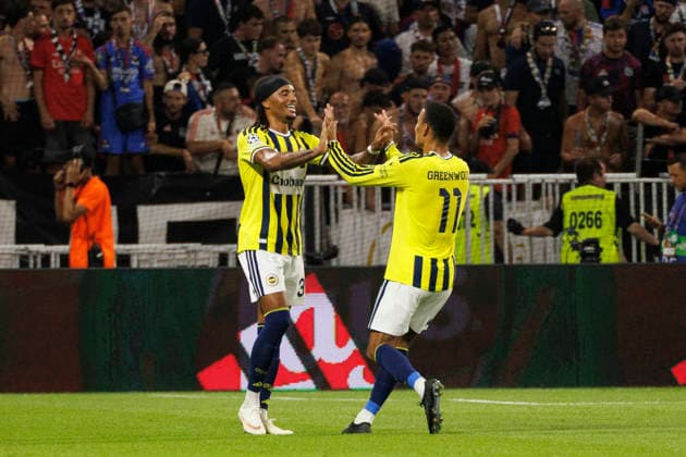 Archie Brown and Mason Greenwood seen celebrating after goal during UEFA Champions League play off qualifying game between teams of Olympique Lyon and Fenerbahce SK (Quentin Montiel-Font Ball Raw Images) DÃ cines-Charpieu Groupama Stadium France Copyright: xQuentinxMontiel-Fontx quentinmontielfont_lyon_fenerbahce_2627-10