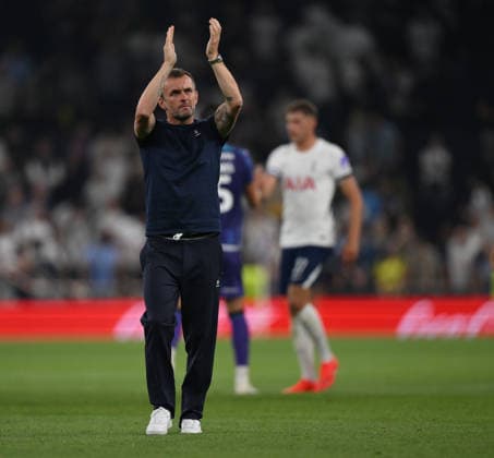 Tottenham Hotspur v Charlton Athletic Carabao Cup Charlton Athletic manager Nathan Jones applauds their fans at full time during the Carabao Cup Second Round match at Tottenham Hotspur Stadium, London 26 08 2026 UK Newspapers OUT Copyright: xDanielxHamburyx FIL-23825-0145