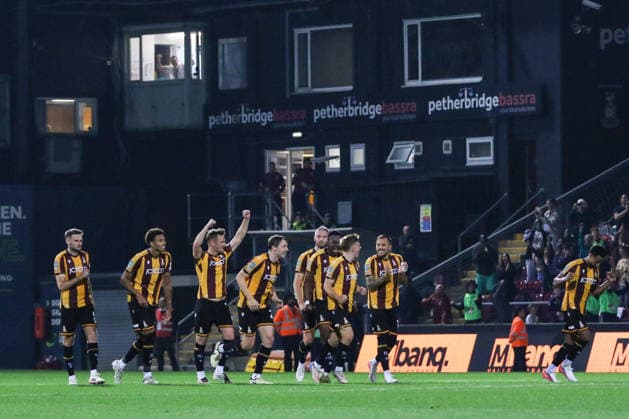 BRADFORD, ENGLAND - AUGUST 26: Bradford City players celebrate after the penalty shootout in Carabao Cup match between Bradford City and Burnley at Valley Parade on August 26, 2026 in Bradford, England. Copyright: xSeanxChandlerx xSPPx Sportspressphoto_SPR216540