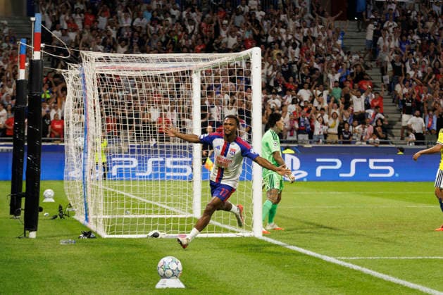 Lois Openda seen celebrating after scoring goal during UEFA Champions League play off qualifying game between teams of Olympique Lyon and Fenerbahce SK (Quentin Montiel-Font Ball Raw Images) DÃ cines-Charpieu Groupama Stadium France Copyright: xQuentinxMontiel-Fontx quentinmontielfont_lyon_fenerbahce_2627-2-2