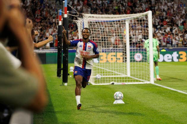 Lois Openda seen celebrating after scoring goal during UEFA Champions League play off qualifying game between teams of Olympique Lyon and Fenerbahce SK (Quentin Montiel-Font Ball Raw Images) DÃ cines-Charpieu Groupama Stadium France Copyright: xQuentinxMontiel-Fontx quentinmontielfont_lyon_fenerbahce_2627-4-2