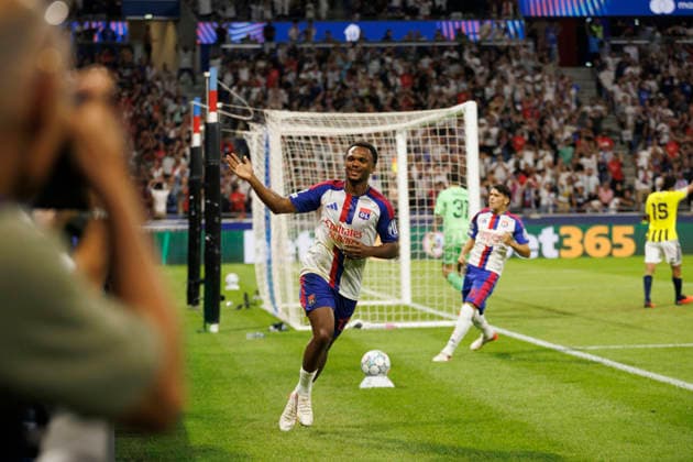 Lois Openda seen celebrating after scoring goal during UEFA Champions League play off qualifying game between teams of Olympique Lyon and Fenerbahce SK (Quentin Montiel-Font Ball Raw Images) DÃ cines-Charpieu Groupama Stadium France Copyright: xQuentinxMontiel-Fontx quentinmontielfont_lyon_fenerbahce_2627-5-2