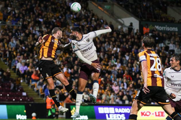 BRADFORD, ENGLAND - AUGUST 26: Armando Broja of Burnley challenges in the air during the Carabao Cup match between Bradford City and Burnley at Valley Parade on August 26, 2026 in Bradford, England. Copyright: xSeanxChandlerx xSPPx Sportspressphoto_SPR216563