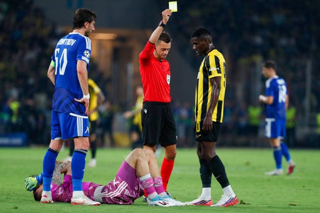 AEK Athens v PFC Levski Sofia UEFA Champions League Zini of AEK Athens receives a yellow card from Match referee Clément Turpin during the UEFA Champions League Play-Off Second Leg match at AEK Arena, Athens 26 08 2026 UK Newspapers OUT Copyright: xYannisxHalasx FIL-23829-0078