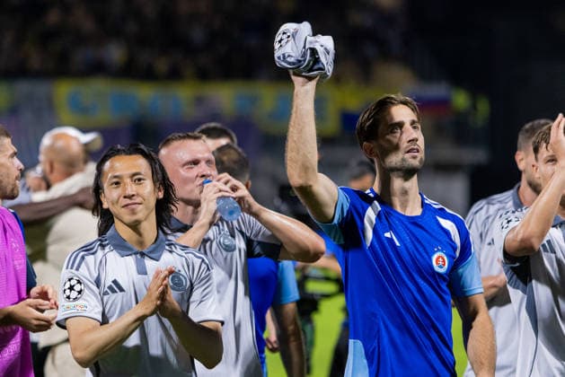 Andraz Sporar of SK Slovan Bratislava and Daiki Matsuoka of SK Slovan Bratislava seen celebrating after UEFA Champions league second leg play-off game between teams of SK Slovan Bratislava and Celje (Dominika Kortvelyesiova Ball Raw Images) Celje Stadion Celje Slovenia Copyright: xDominikaxKortvelyesiovax DKOR4369
