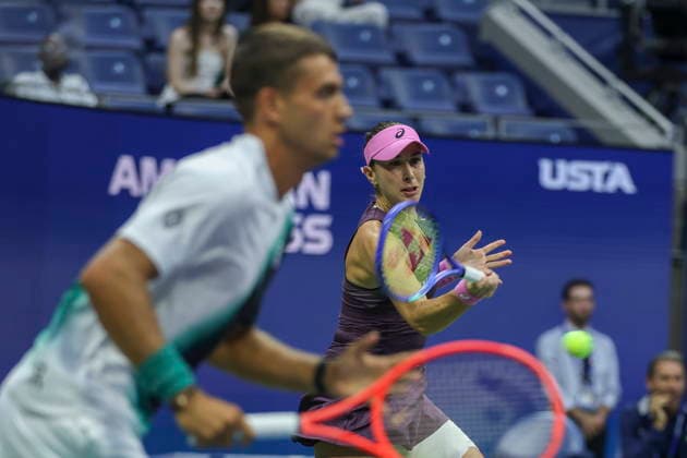 2026 US Open Mixed Doubles Championship semifinals Belinda Bencic (rear) of Switzerland in action while playing with Flavio Cobolli (front) of Italy during the semifinal round of the Mixed Doubles Championship against Elina Svitolina of Ukraine and Gael Monfils of France at the Arthur Ashe Stadium in the USTA Billie Jean King National Tennis Center in Flushing Meadows, New York, USA, 26 August 2026. FLUSHING MEADOWS NEW YORK UNITED STATES  Copyright: xSARAHxYENESELx