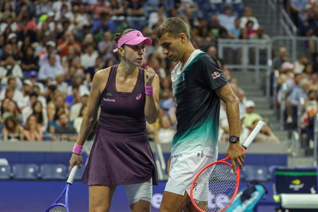 2026 US Open Mixed Doubles Championship semifinals Belinda Bencic (L) of Switzerland and Flavio Cobolli (R) of Italy react during the semifinal round of the Mixed Doubles Championship against Elina Svitolina of Ukraine and Gael Monfils of France at the Arthur Ashe Stadium in the USTA Billie Jean King National Tennis Center in Flushing Meadows, New York, USA, 26 August 2026. FLUSHING MEADOWS NEW YORK UNITED STATES  Copyright: xSARAHxYENESELx