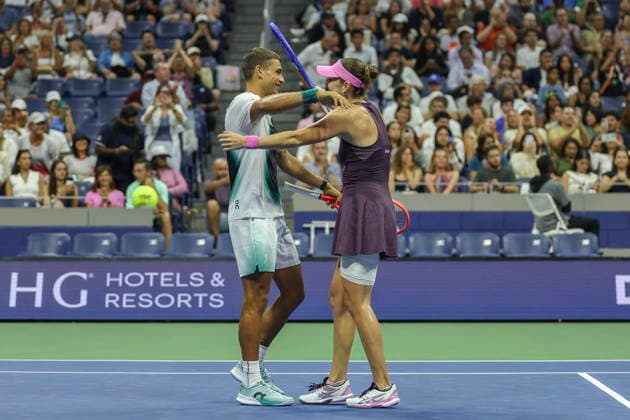 2026 US Open Mixed Doubles Championship semifinals Belinda Bencic (L) of Switzerland and Flavio Cobolli (R) of Italy react to winning the semifinal round of the Mixed Doubles Championship against Elina Svitolina of Ukraine and Gael Monfils of France at the Arthur Ashe Stadium in the USTA Billie Jean King National Tennis Center in Flushing Meadows, New York, USA, 26 August 2026. FLUSHING MEADOWS NEW YORK UNITED STATES  Copyright: xSARAHxYENESELx