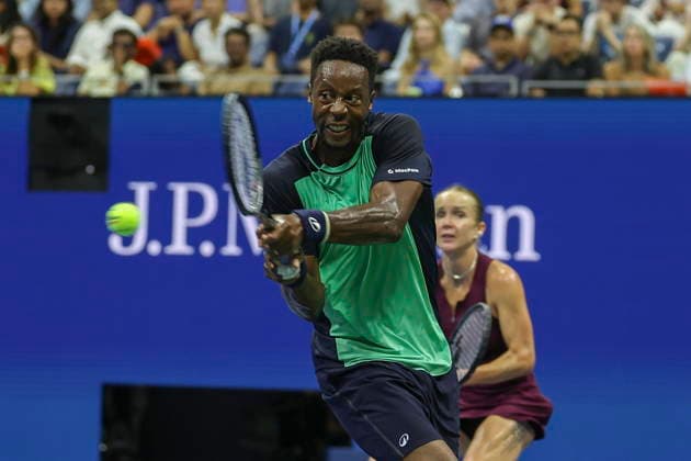 2026 US Open Mixed Doubles Championship semifinals Gael Monfils (front) of France in action while playing with Elina Svitolina (rear) of Ukraine during the semifinal round of the Mixed Doubles Championship against Belinda Bencic of Switzerland and Flavio Cobolli of Italy at the Arthur Ashe Stadium in the USTA Billie Jean King National Tennis Center in Flushing Meadows, New York, USA, 26 August 2026. FLUSHING MEADOWS NEW YORK UNITED STATES  Copyright: xSARAHxYENESELx