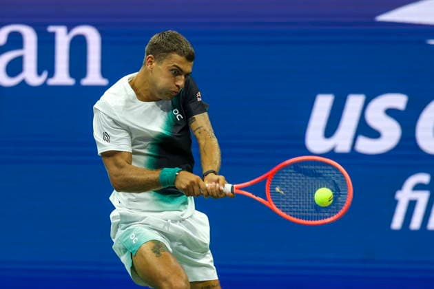 2026 US Open Mixed Doubles Championship Flavio Cobolli of Italy in action while playing with Belinda Bencic of Switzerland during the final round of the Mixed Doubles Championship against Jakub Mensik and Karolina Muchova of Czechia at the Arthur Ashe Stadium in the USTA Billie Jean King National Tennis Center in Flushing Meadows, New York, USA, 26 August 2026. FLUSHING MEADOWS NEW YORK UNITED STATES  Copyright: xSARAHxYENESELx