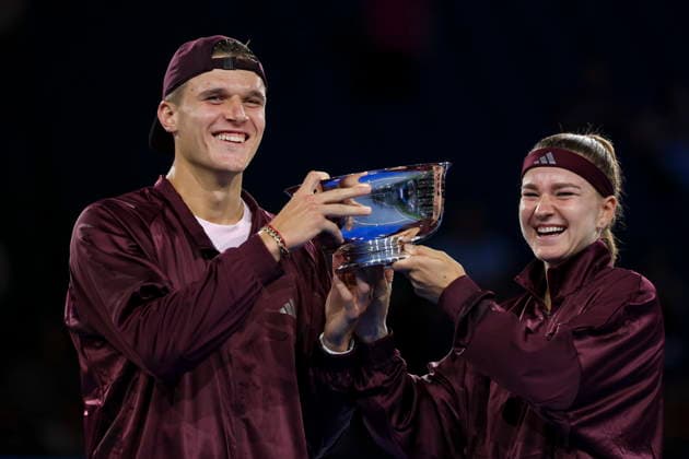 2026 US Open Mixed Doubles Championship Jakub Mensik (L) and Karolina Muchova (R) of Czechia pose with their trophy after winning the final round of the Mixed Doubles Championship against Belinda Bencic of Switzerland and Flavio Cobolli of Italy at the Arthur Ashe Stadium in the USTA Billie Jean King National Tennis Center in Flushing Meadows, New York, USA, 26 August 2026. FLUSHING MEADOWS NEW YORK UNITED STATES  Copyright: xSARAHxYENESELx