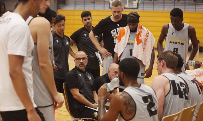 Ludwigsburg, Basketball Exhibition Game: MHP Riesen Ludwigsburg vs. HAKRO Merlins Crailsheim; Coach Carles Duran of the Riesen with his team during a timeout