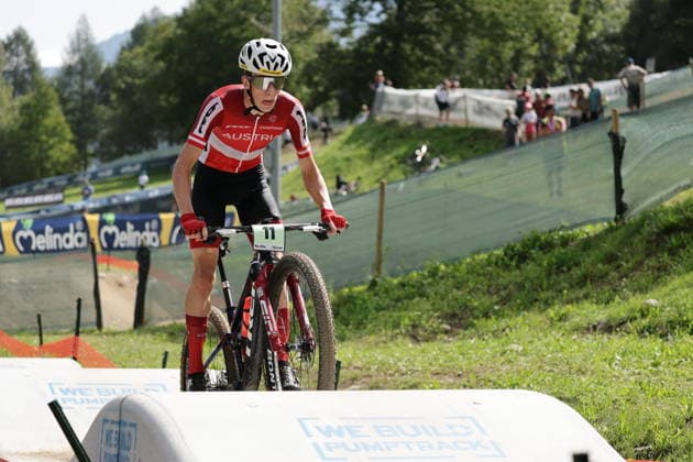August 27, 2026, Daolasa di Commezzadura, Val di Sole Bikeland, 2026 UCI MTB World Championships, Men’s Junior XCO (Cross Country Olympic), Michael Hettegger, 11, AUT, Daolasa di Commezzadura, Val di Sole Bikeland, Trento, Italy Copyright: xJustPictures.ch FrancescoxMinghettix jp-en-FrMi-MNG_0191