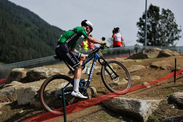 2026 UCI Mountain Bike World Championships Picture by Alex Whitehead SWpix.com - 27 08 2026 - Cycling - 2026 UCI Mountain Bike World Championships - Val di Sole, Trentino, Italy - Cross-country Olympic (XCO) - Men Junior - Caleb McGreevy (Ireland) Copyright: x xSWpix.comx(t axPhotographyxHubxLtd)xAlexxWhitehead SWpix.comx SWP-3030-19891