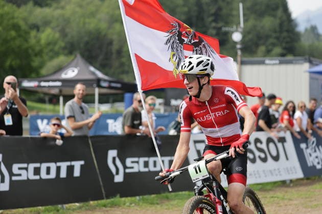 August 27, 2026, Daolasa di Commezzadura, Val di Sole Bikeland, 2026 UCI MTB World Championships, Men s Junior XCO (Cross Country Olympic), Michael Hettegger (11, AUT) finishing in second place in Daolasa di Commezzadura, Val di Sole Bikeland, Trento, Italy Copyright: xJustPictures.ch FrancescoxMinghettix jp-en-FrMi-MNG_0350