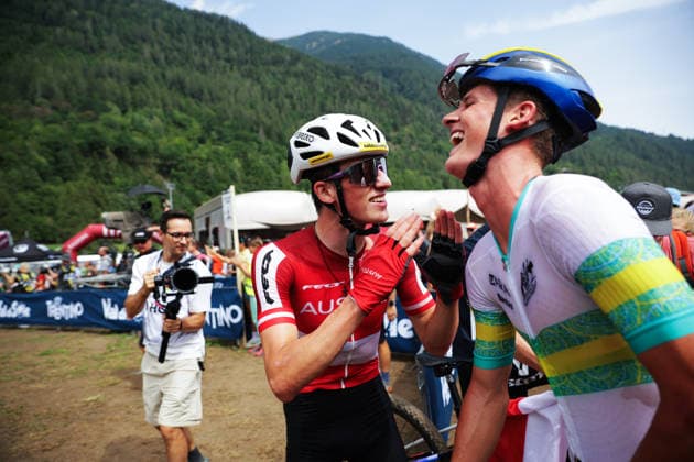 2026 UCI Mountain Bike World Championships Picture by Ed Sykes SWpix.com - 27 08 2026 - Cycling - 2026 UCI Mountain Bike World Championships - Val di Sole, Trentino, Italy - Cross-country Olympic (XCO) - Men Junior - Connor Wright (Australia) wins to become World Champion and celebrates with second place Michael Hettegger (Austria) Copyright: x xSWpix.comx(t axPhotographyxHubxLtd)xEdxSykes SWpix.comx SWP-3030-19907