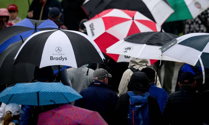 2026 KPMG Women s Irish Open, The K Club, Kildare 27 8 2026 Spectators shelter from the rain as they make their way down the 1st hole Spectators shelter from the rain as they make their way down the 1st hole 27 8 2026  Copyright: xx NE1L9784 copy