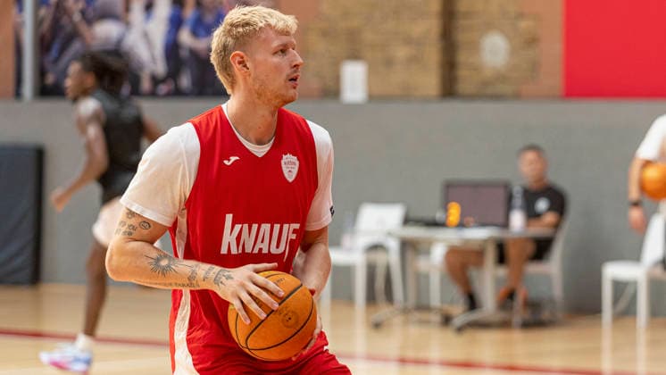 Pictured: Aaron Kayser of the Würzburg Baskets, age 22, with the ball on August 27, 2026, during a media training session for the Fitness First Würzburg Baskets on August 27, 2026, in Würzburg, Germany, at the training center, Copyright: HMBxMedia xJulienxBecker