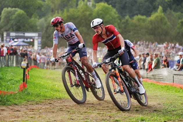 2026 UCI Mountain Bike World Championships Picture by Alex Whitehead SWpix.com - 27 08 2026 - Cycling - 2026 UCI Mountain Bike World Championships - Val di Sole, Trentino, Italy - Cross-country Short Track (XCC) - Men Elite - Sondre Rokke (Norway), Christopher Blevins (USA) Copyright: x xSWpix.comx(t axPhotographyxHubxLtd)xAlexxWhitehead SWpix.comx SWP-3030-20188