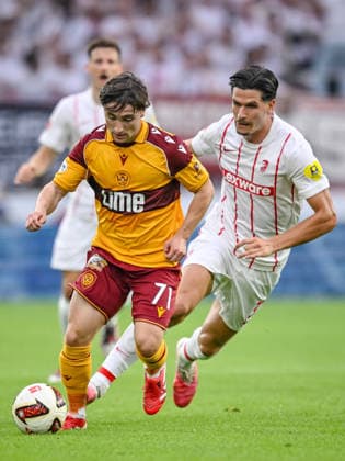 Joe Hodge of Motherwell FC and Igor Matanovic SC Freiburg battles for the ball during the second leg of the 2026-27 UEFA Conference League Playoff Round match between Sport Club Freiburg and Motherwell at Stadion am Wolfswinkel on August 27, 2026, in Freiburg, Germany. Photo by Harry Langer, DeFodi Images