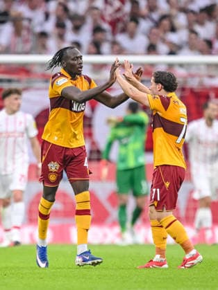 Emmanuel Longelo of Motherwell FC celebrates with his teammates after scoring his team s first goal during the second leg of the 2026-27 UEFA Conference League Playoff Round match between Sport Club Freiburg and Motherwell at Stadion am Wolfswinkel on August 27, 2026, in Freiburg, Germany. Photo by Harry Langer, DeFodi Images