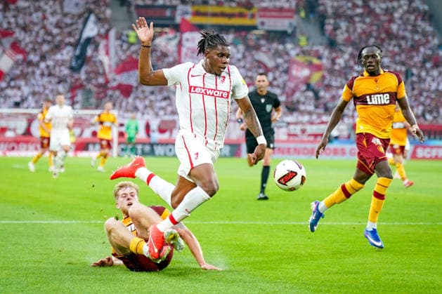 Germany UEFA Conference League Qualifiers: SC Freiburg vs. FC Motherwell, Playoffs 2026–2027, Europa-Park Stadium, Freiburg; Cyriaque Irie (SC Freiburg, 22) and Ewan Wilson (Motherwell FC, 23) Copyright: xJOERANxSTEINSIEKx