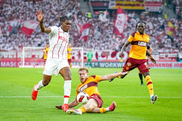 Germany UEFA Conference League Qualifiers: SC Freiburg vs. FC Motherwell, Playoffs 2026–2027, Europa-Park Stadium, Freiburg; Cyriaque Irie (SC Freiburg, 22) and Ewan Wilson (Motherwell FC, 23) Copyright: xJOERANxSTEINSIEKx
